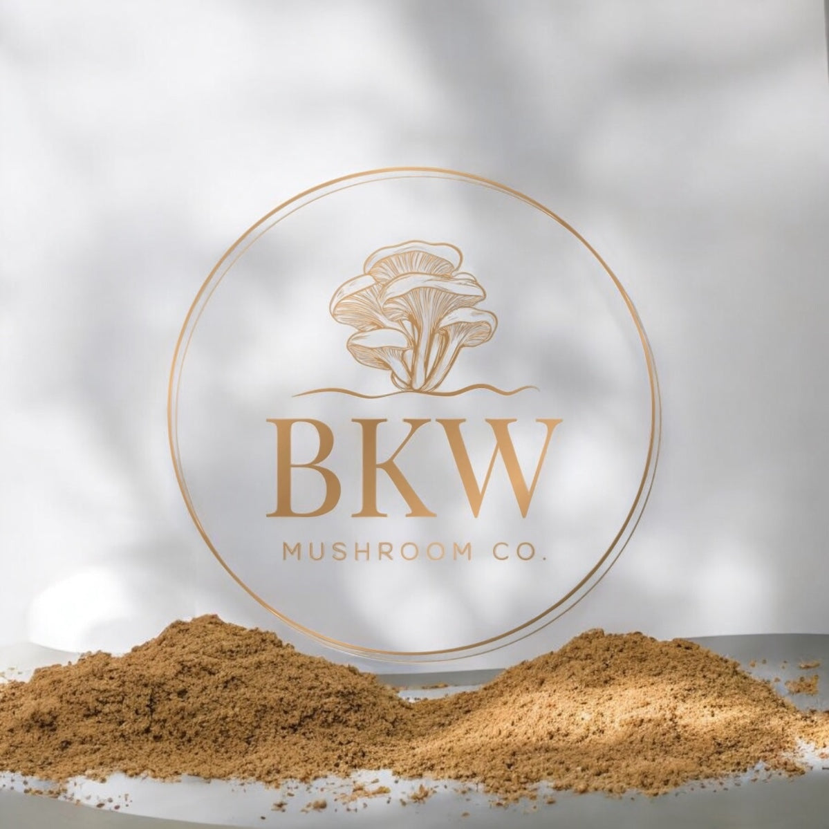 Logo of BKW Mushroom Co. with mushroom extract powder in two piles in foreground.